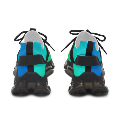 Pair of black, blue, and green sneakers on a white background