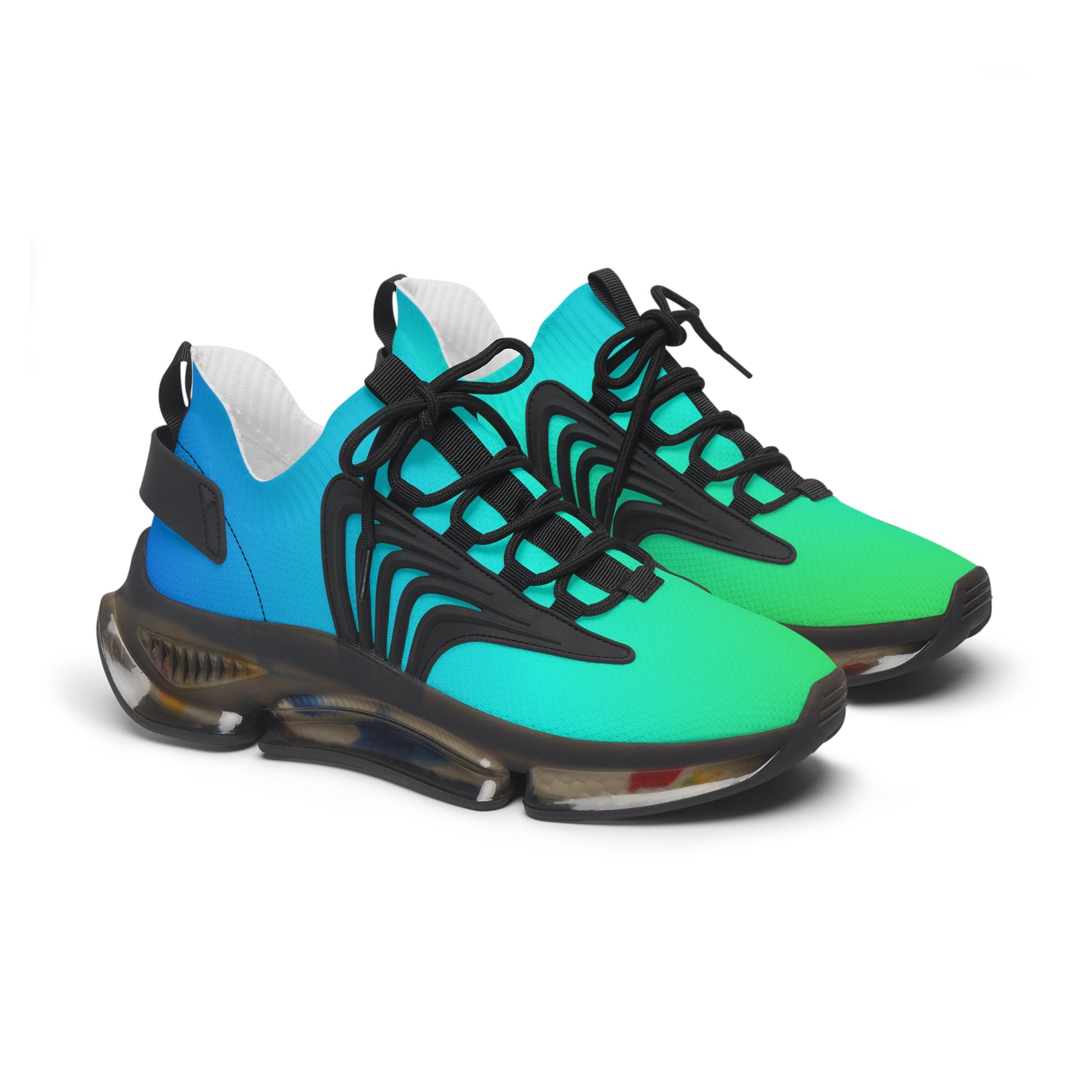 Pair of blue and green sneakers with black laces on a white background