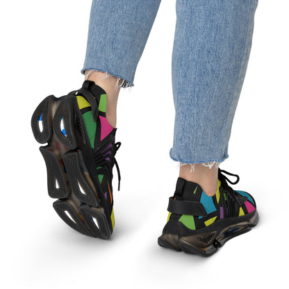 Black high-top sneakers with colorful accents worn with blue jeans on a white background