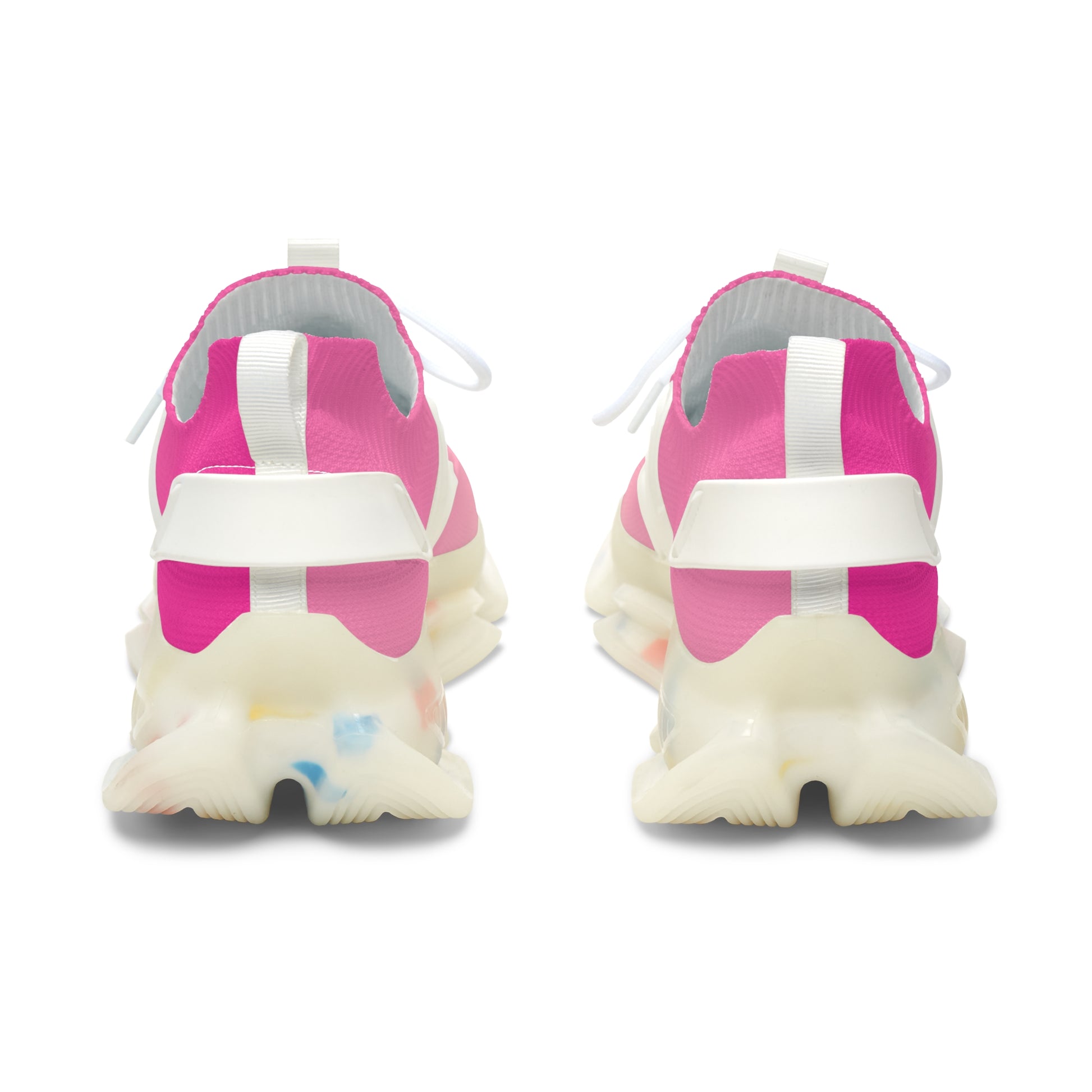 Pink and white sneakers with thick white soles on a white background