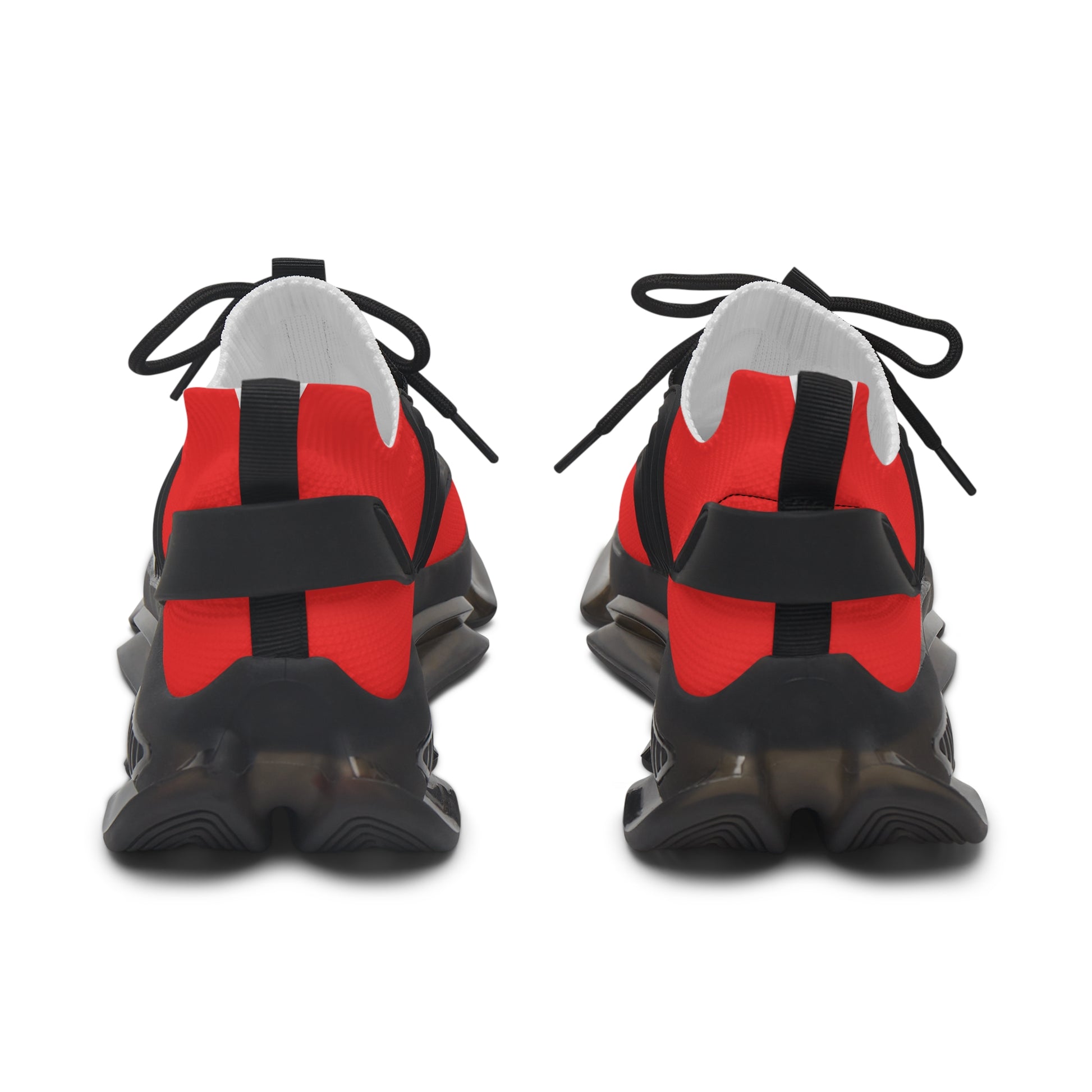 Red and black sneakers with white soles on a white background