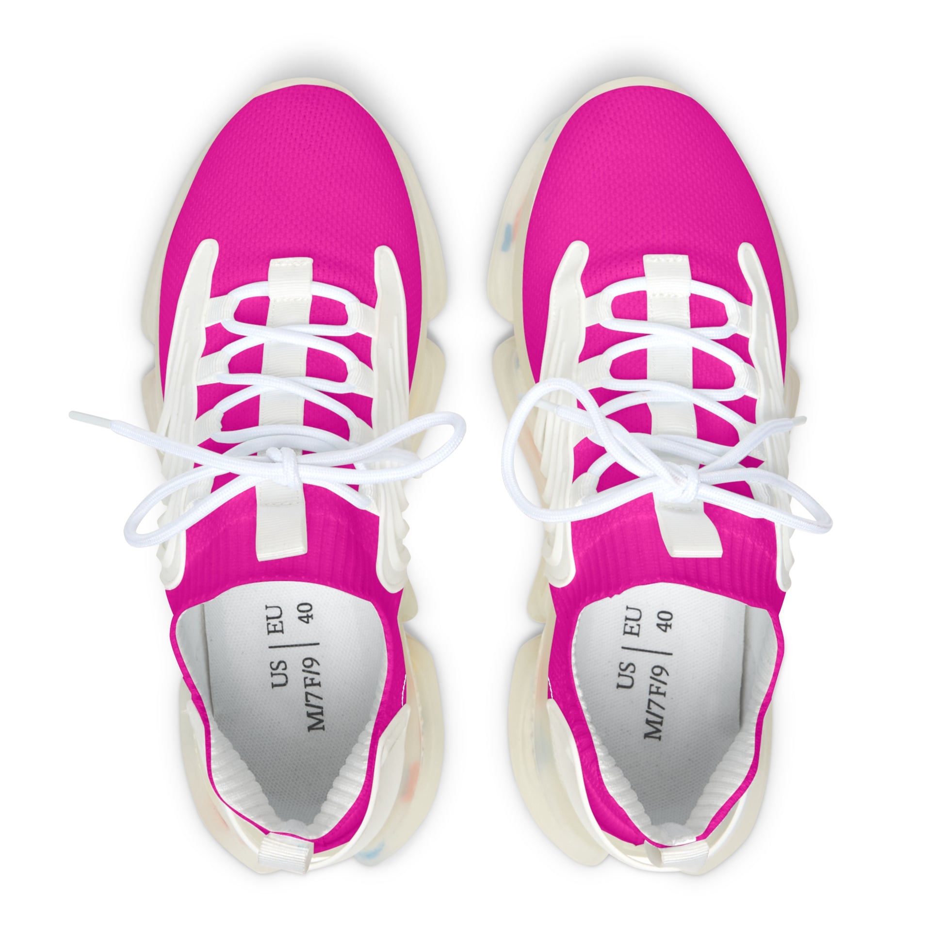 Pair of bright pink sneakers with white laces on a white background