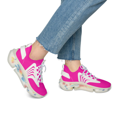 Pink sneakers with white accents worn with blue jeans on a white background