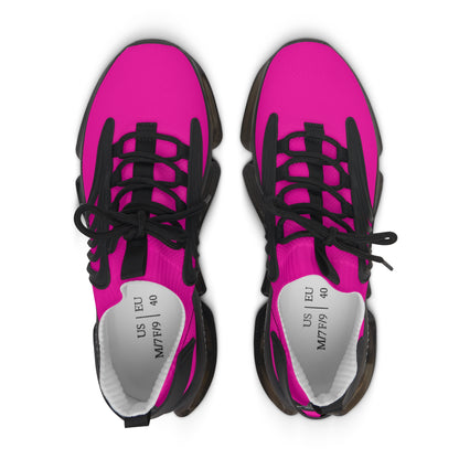 Pair of bright pink sneakers with black laces on a white background